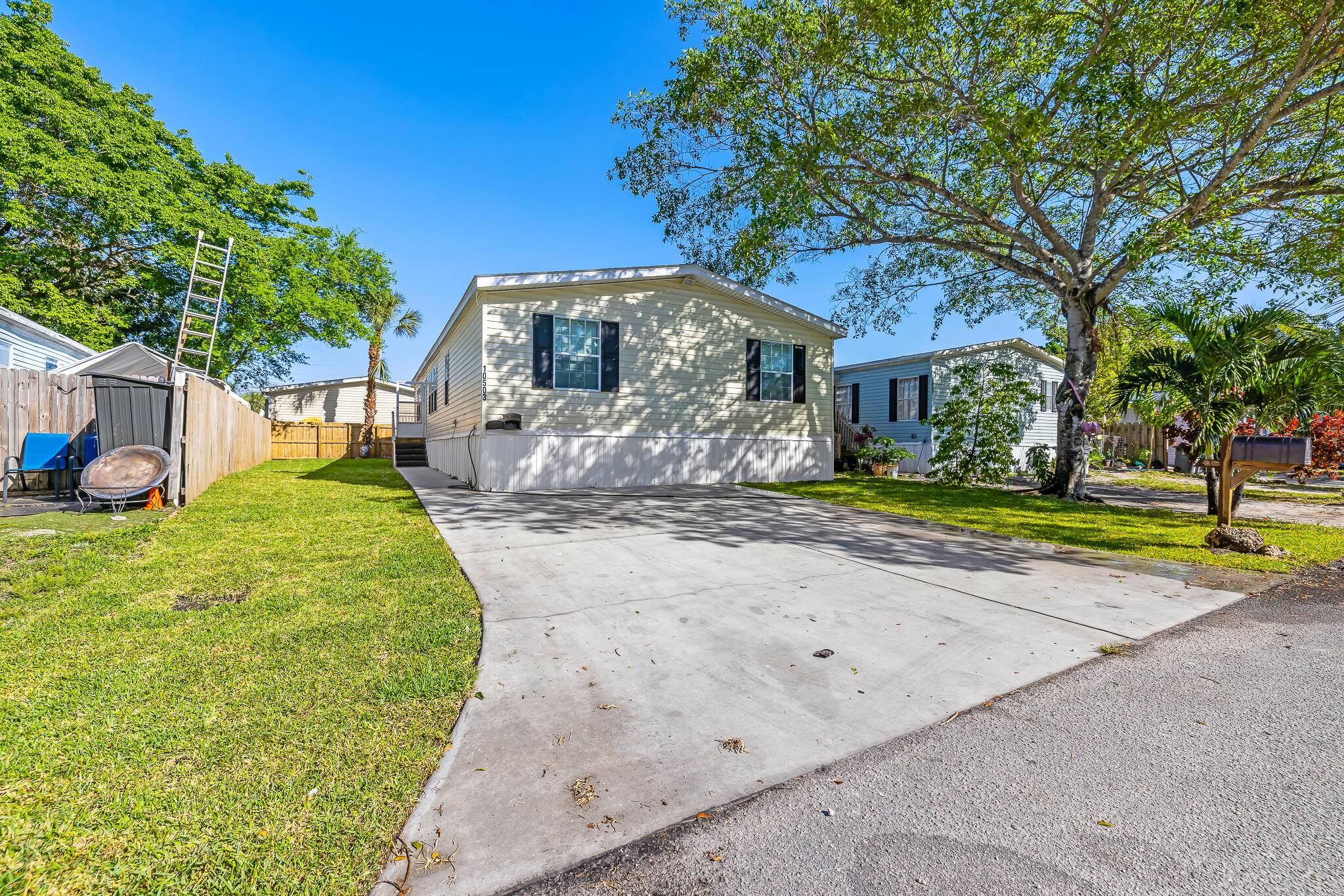 Affordable and stylish manufactured home in sought after Watergate where you own both the land and the home !
