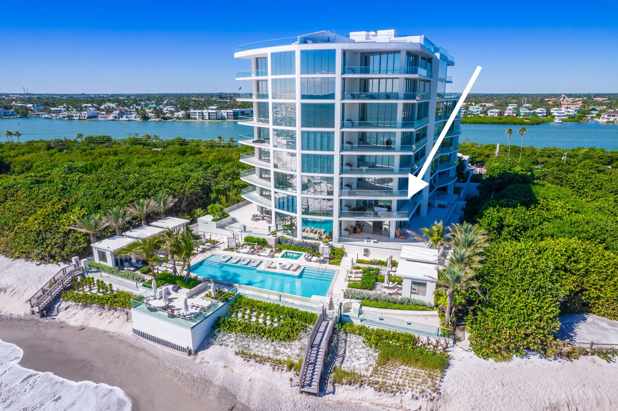 Exceptional opportunity to own this luxurious designer residence at the prestigious SeaGlass Condominium on Jupiter Island offering sweeping, uninterrupted ocean views.