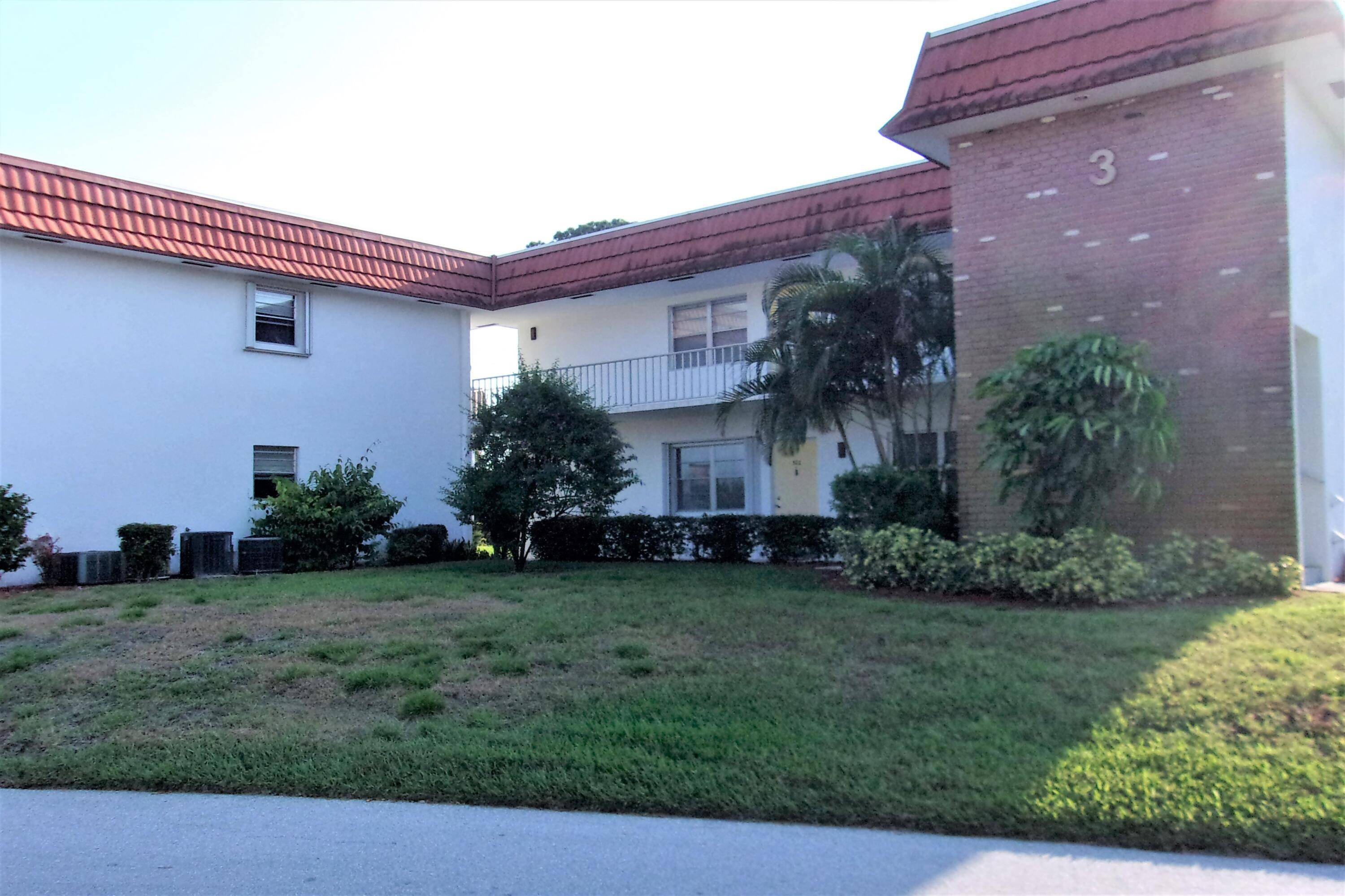 Just bring your bathing suit and golf clubs and be right at home with updates including flooring, A C and HWH, Plantation shutters, decorative fireplace and more !