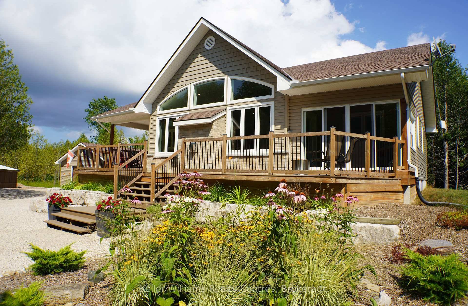 Built in 2018, this neat as a pin 2 bedroom, 2 bath bungalow sits on a 1 acre lot with 318 feet of frontage, backing onto the protected Niagara Escarpment.