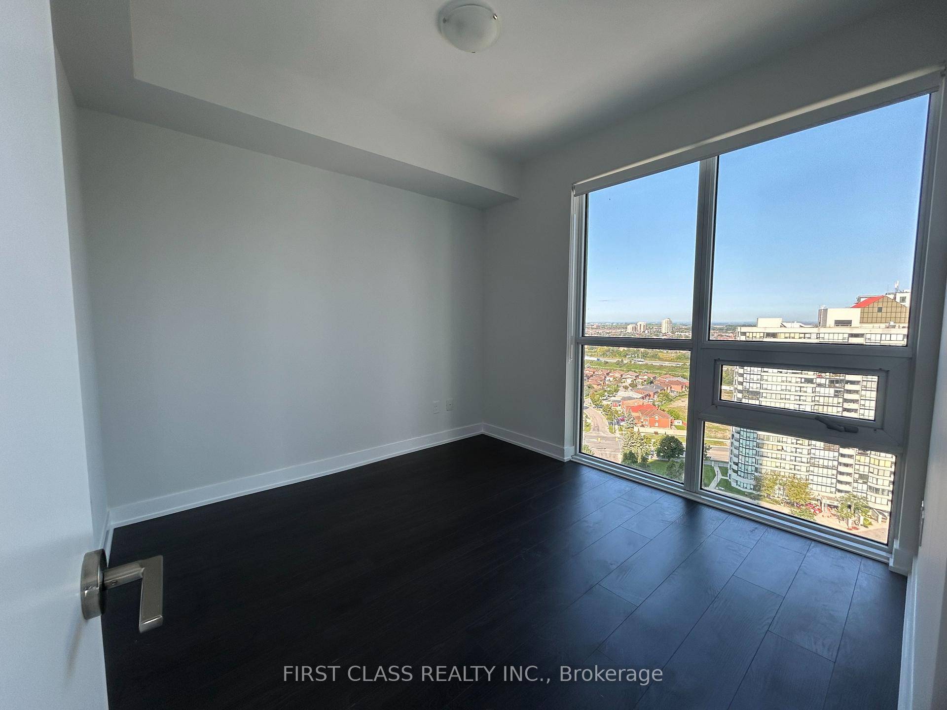 This unit boasts laminate floors throughout, along with quartz counters and high end built in stainless steel appliances in the kitchen.