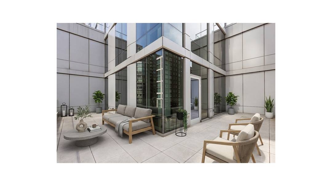 An Expansive Corner 2 Bedroom with a Sprawling Wrap Around Terrace Residences Feature Bosch in residence washer and dryer 7 white oak plank flooring Deluxe white marble kitchen countertops Premium ...