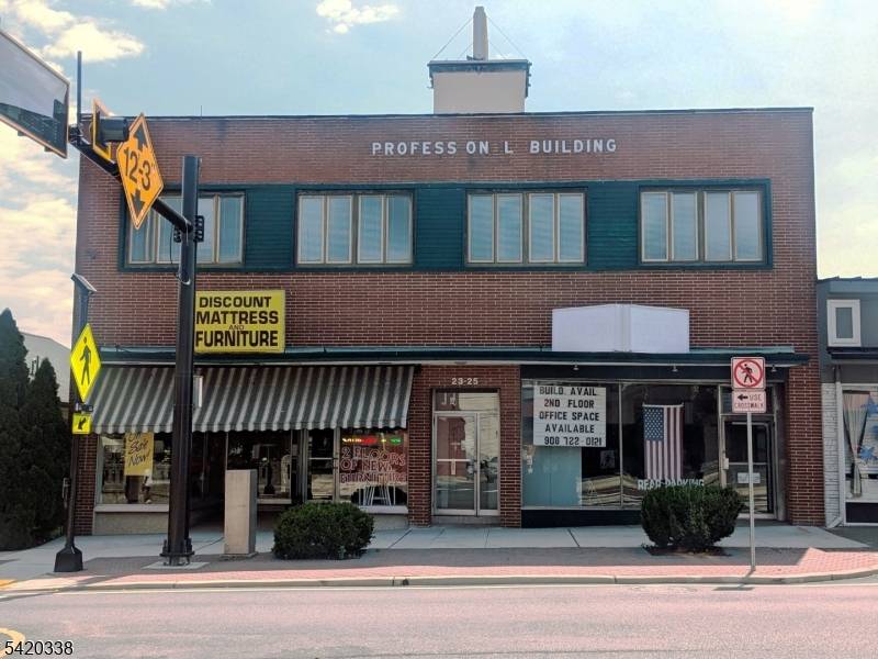 Mixed use retail and elevated office building located downtown Manville.