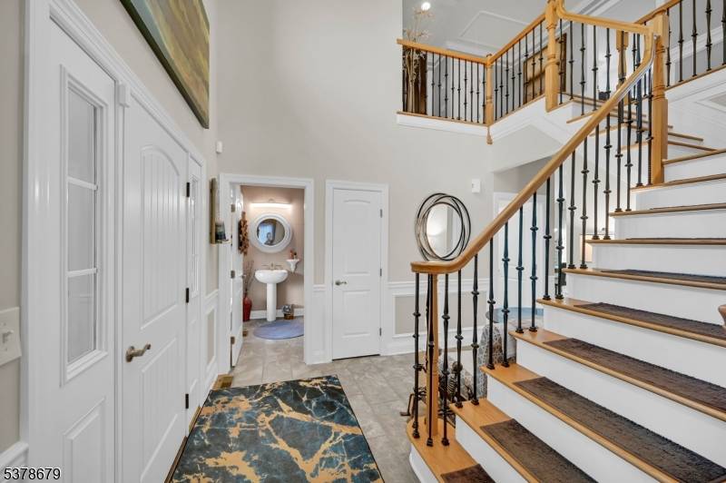 Nestled on a quiet cul de sac, this 4BR, 2 full 2 half bath home blends style with smart upgrades.