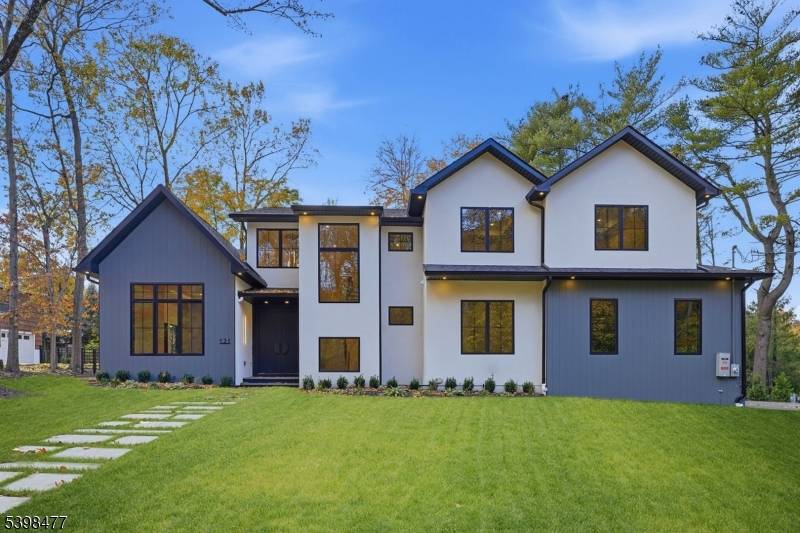 Luxury takes center stage in this remarkable new custom home offering over 6700 sq ft of beautifully finished living space on 0.