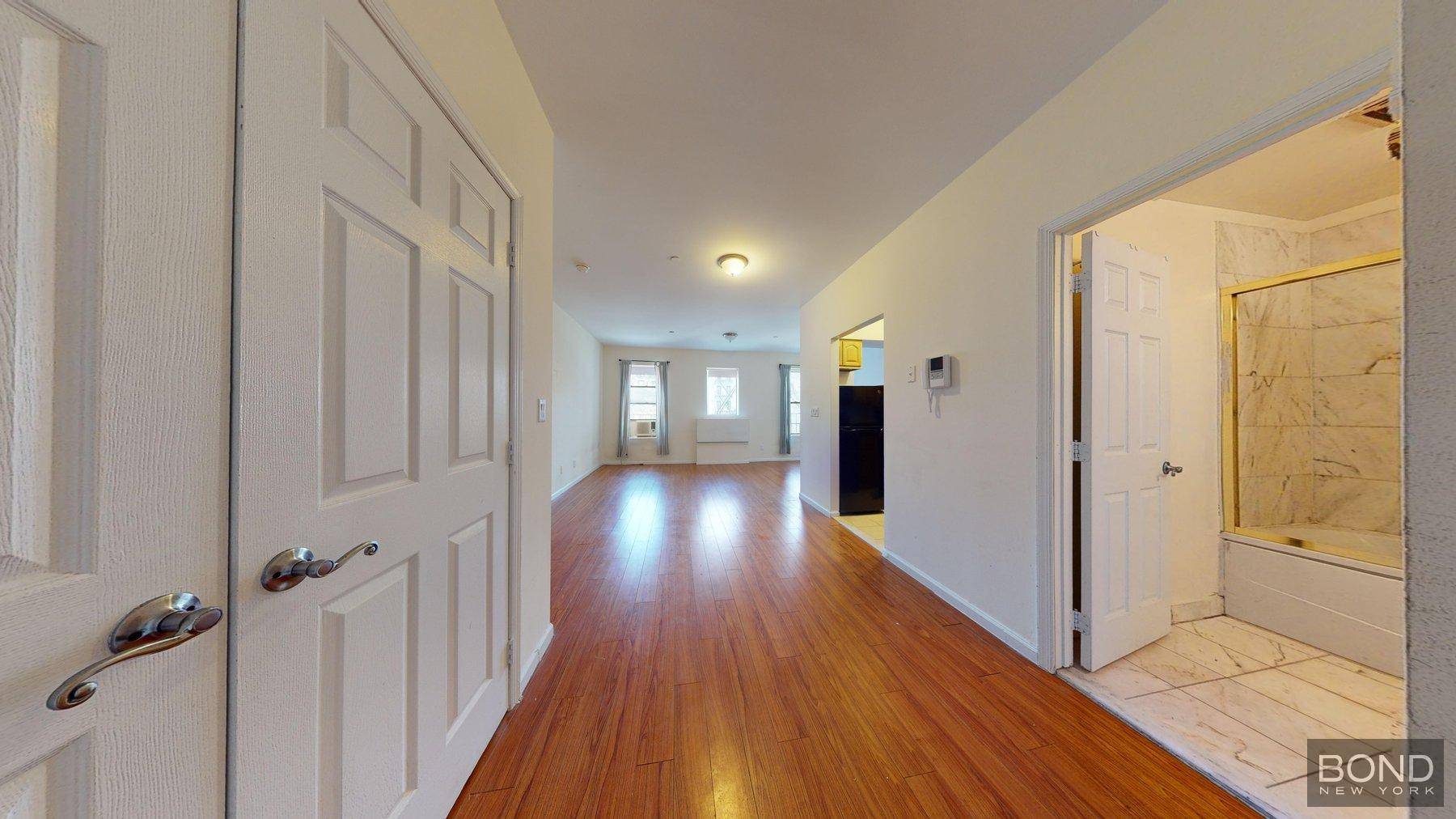 Renovated 2 bedroom duplex with a home office or 3rd bedroom.