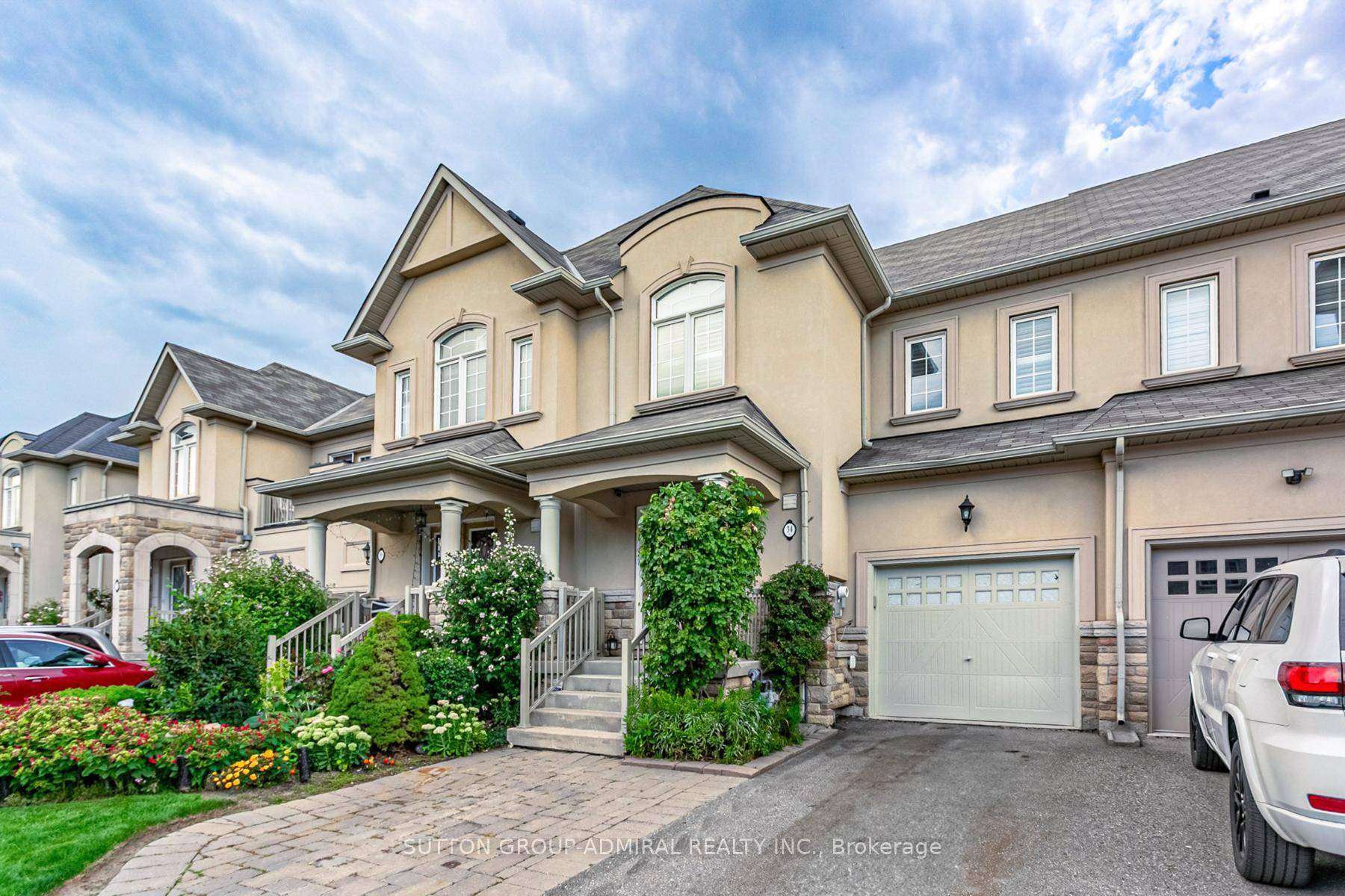 This is your rare opportunity to own a freehold executive townhome in the Estate of Credit Ridges, a prestigious Mississauga Road area community located in the Flower Town of Canada.