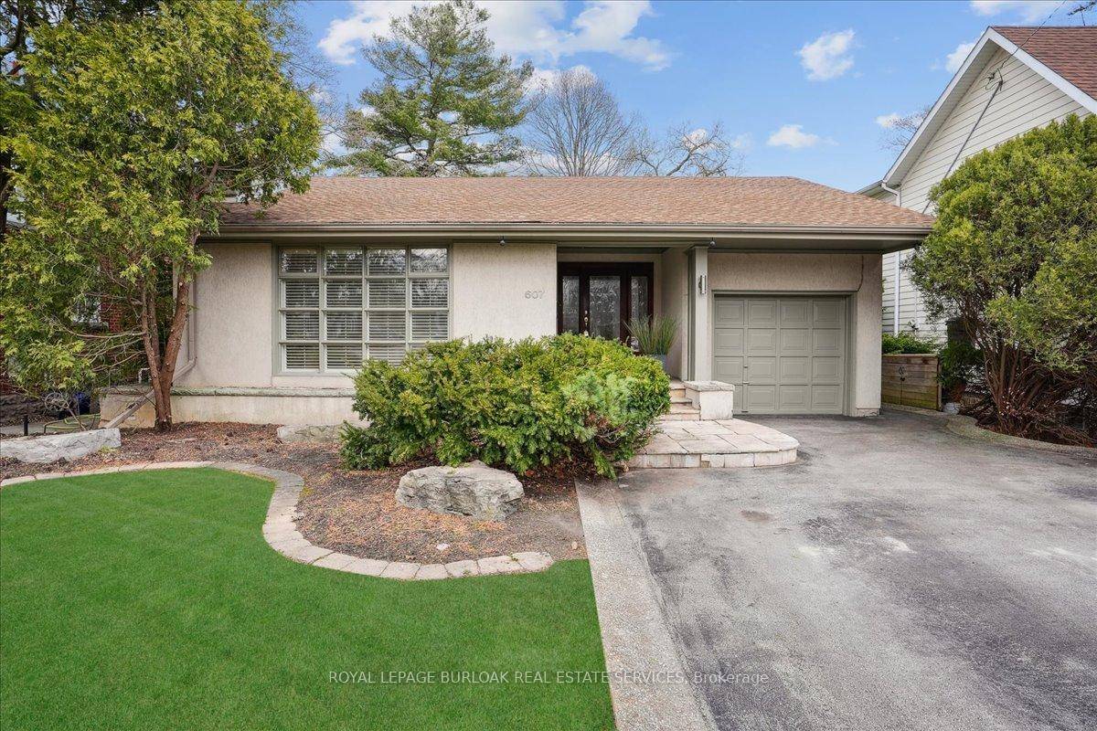 Located in the heart of downtown Burlington, this rare bungalow style home features a beautifully renovated space with 1 1 bdrm's originally 3 amp ; 2.