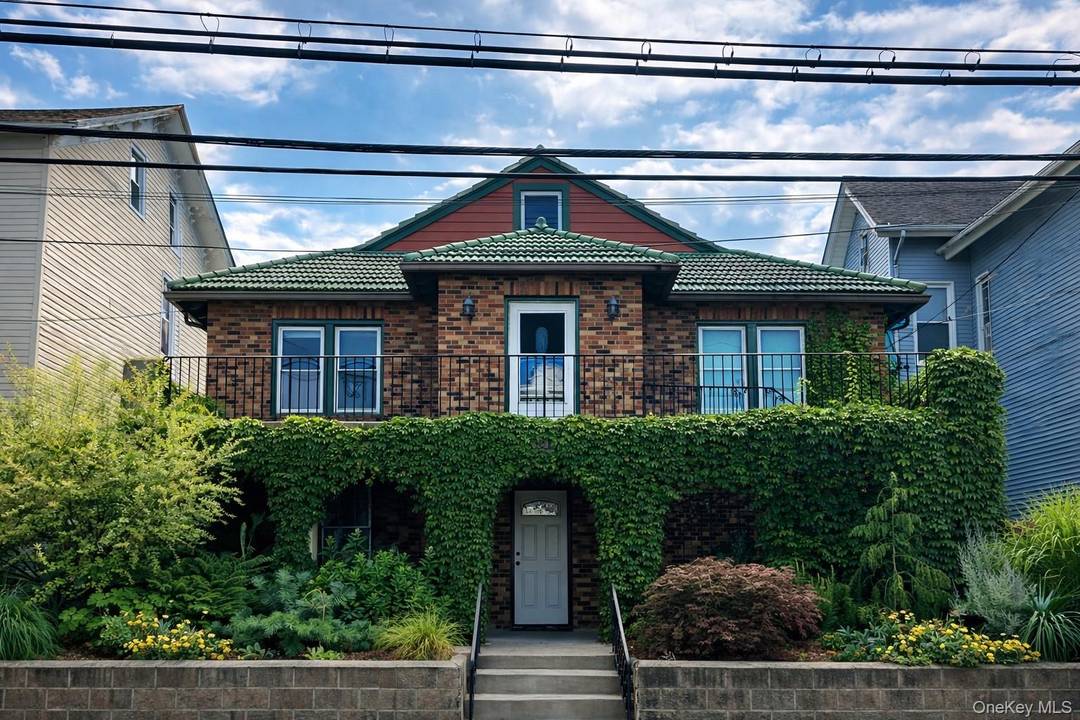 This carefully restored brick two family offers a rare blend of durability, flexibility, and long term upside in the heart of Ossining.