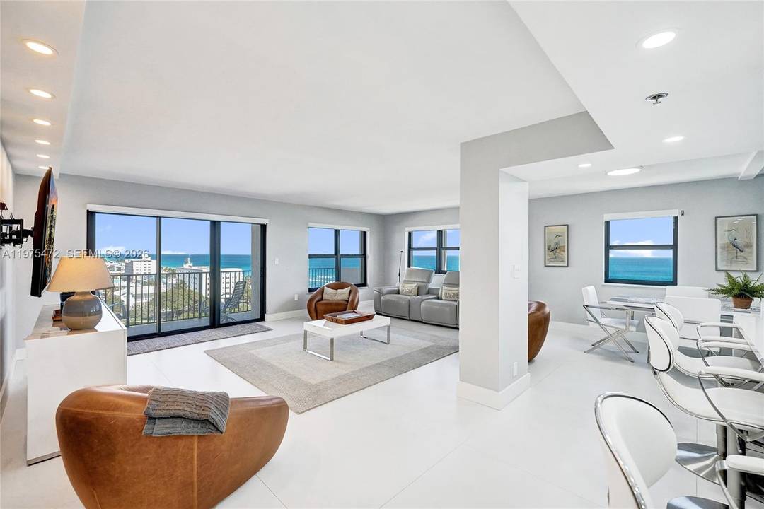 DESIGNER RENOVATED 3 BEDROOM 3 BATH CORNER RESIDENCE ON THE 10TH FLOOR WITH SPECTACULAR DIRECT OCEAN VIEWS FROM MULTIPLE EXPOSURES !