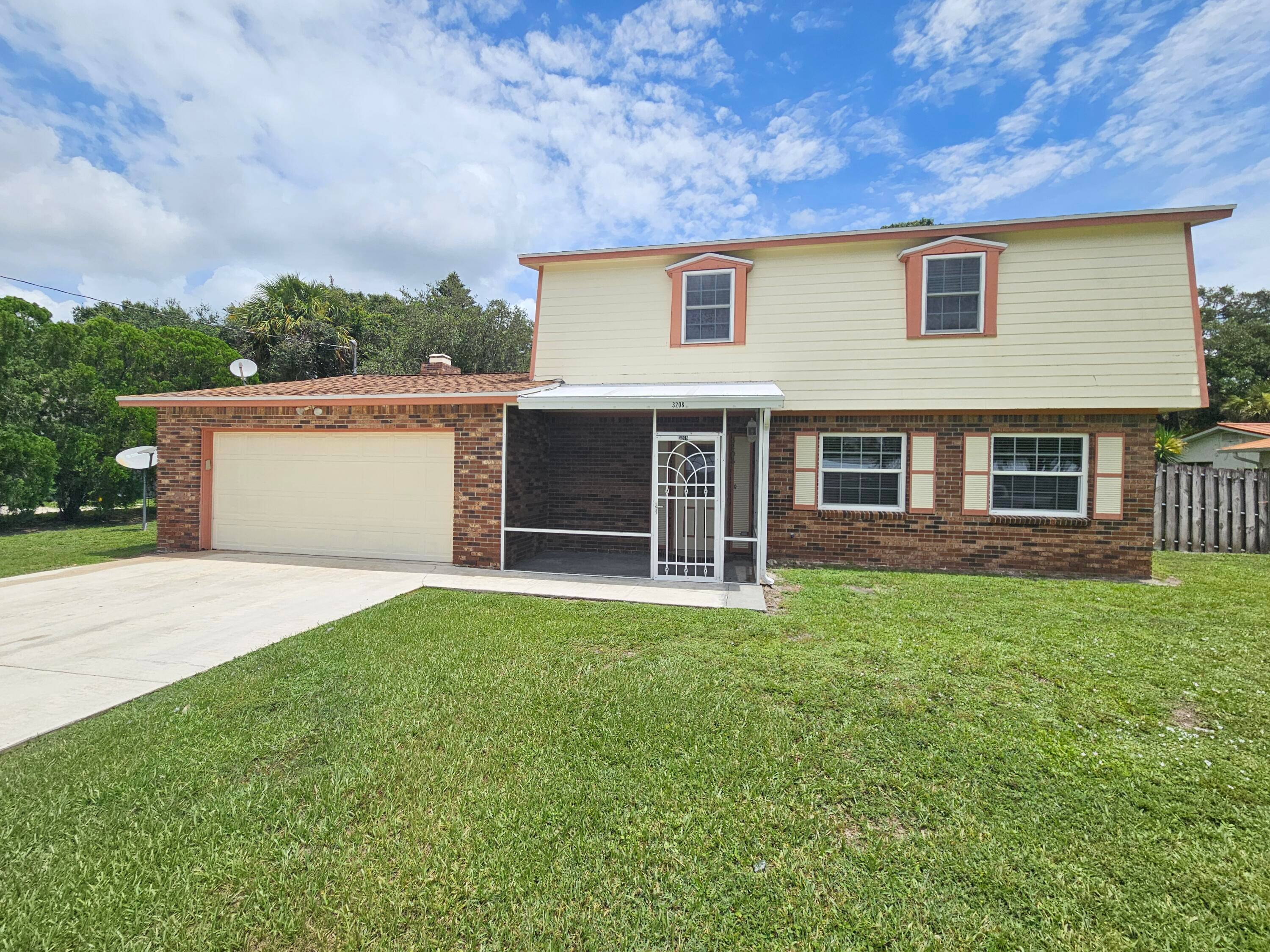 Great 2 story Family home, large fenced in backyard for playing, screened in pool !
