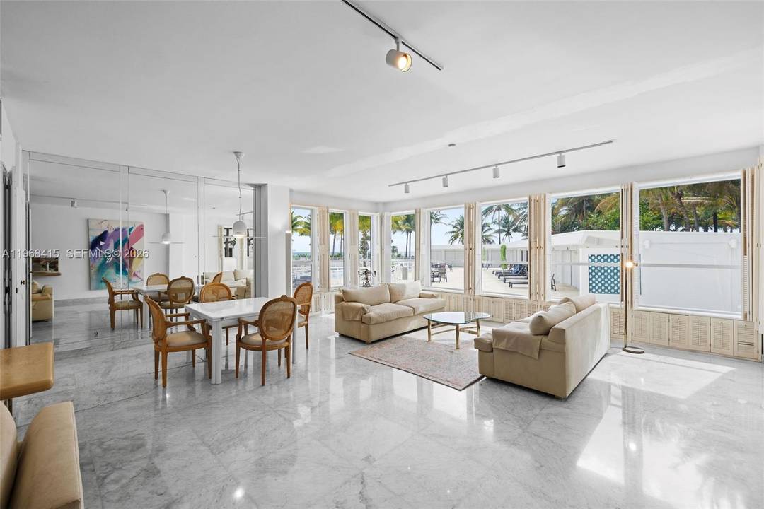 Bright and spacious first floor walk up residence with direct views of the pool, beach, and sunrise.