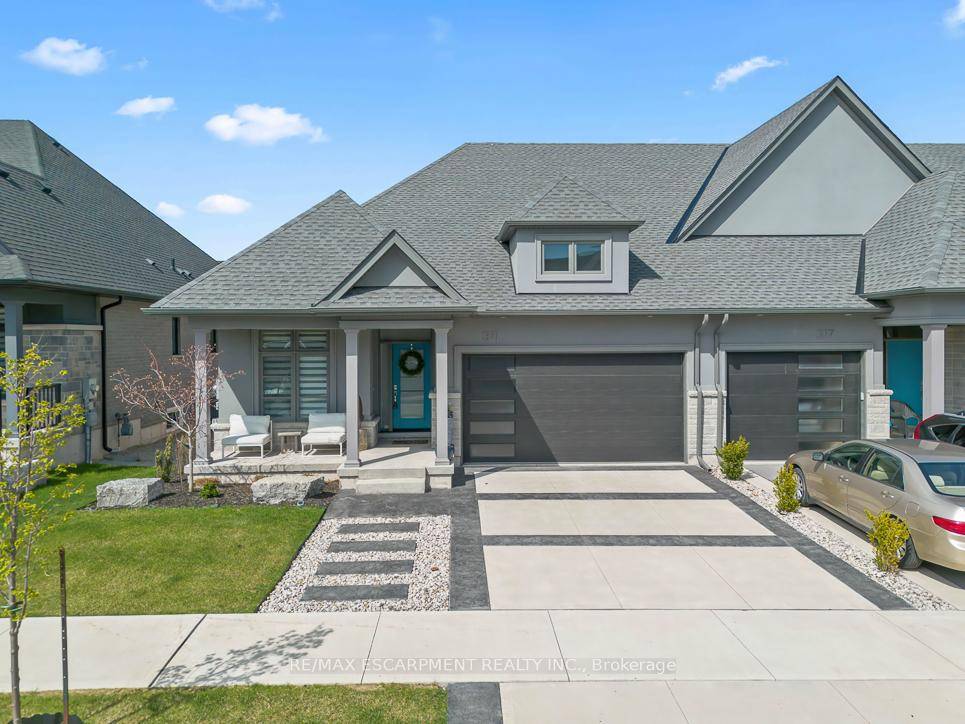 Welcome to 311 Perth Trail, an absolutely stunning home built by Lucchetta and customized by the homeowner.