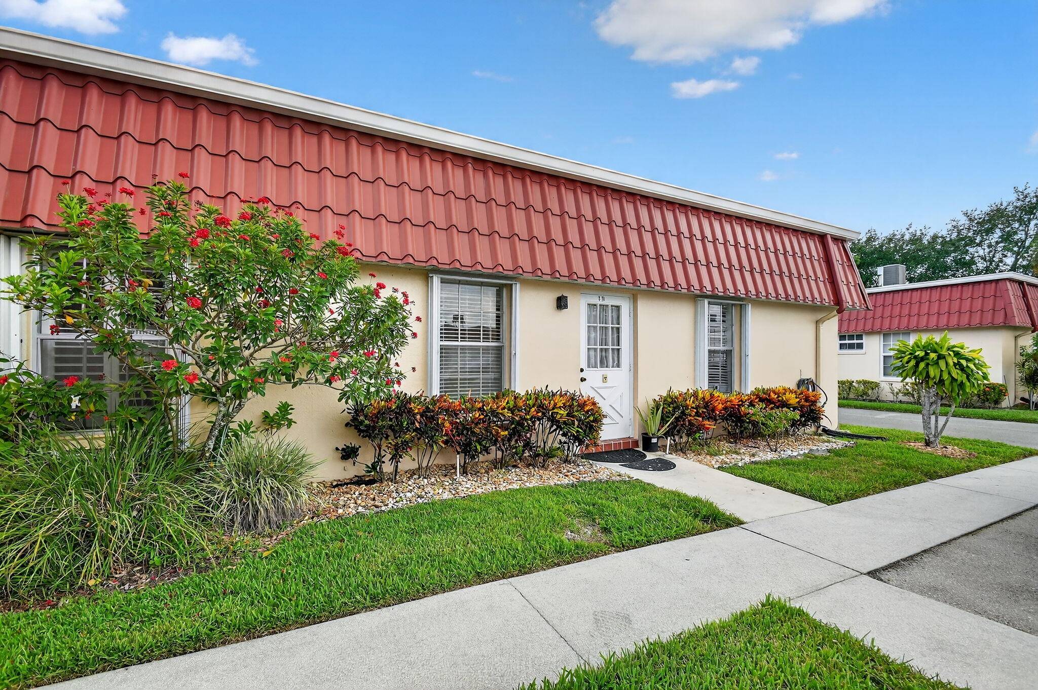 Welcome to this beautifully maintained two bedroom, two bathroom corner unit in the sought after 55 Covered Bridge community.