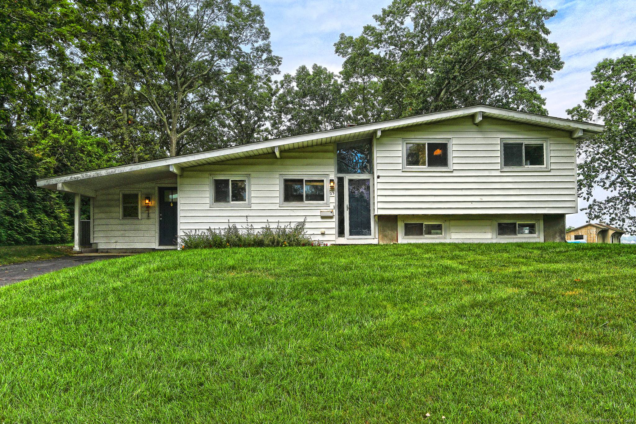 Mid Century Modern Gem with Marsh Views and sunsets in Cornfield Point.
