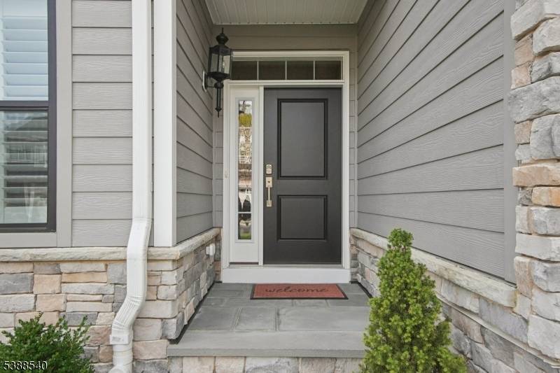 Nestled in the desirable Villas at Warren enclave, this sophisticated 3 bedroom, 3 bath residence spans about 2, 783 square feet of thoughtfully designed living space.