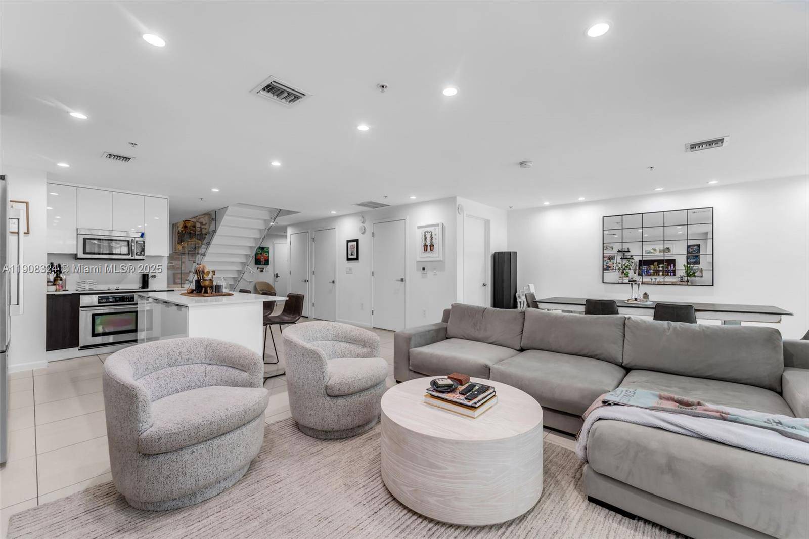 Exceptional 2 story residence offers 3 3 at Four Midtown, featuring 1, 945 sqft of living space and a 65 sqft balcony.