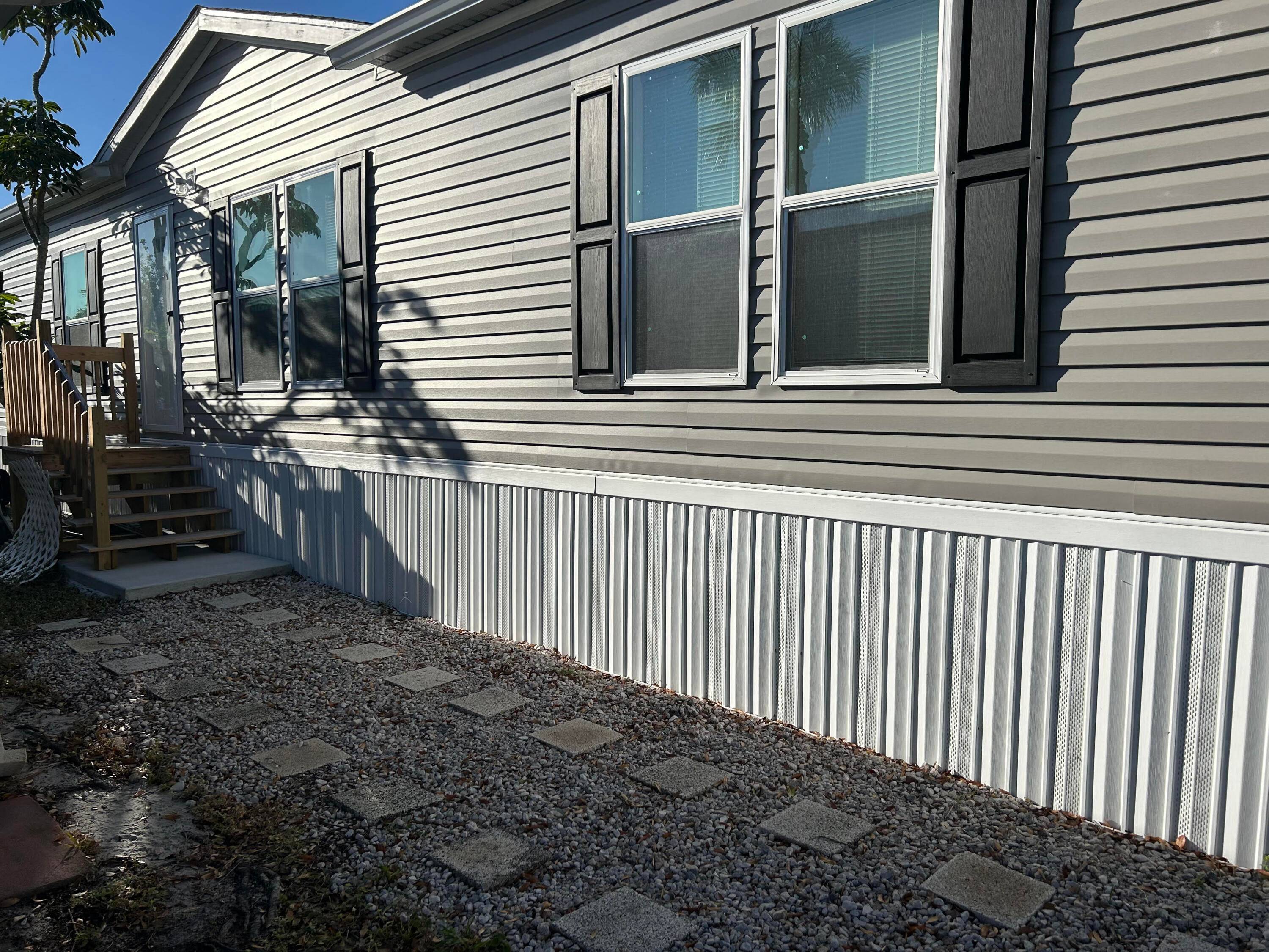 Brand new manufactured home LAND INCLUDED Live Oak Builder Nitro model 1550 sq ft located in Leisure Village co op low HOA 275 month includes water, sewer, lawn, cable community ...