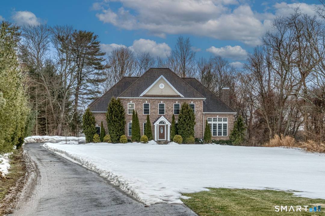 Hillandale Estates Spacious brick Colonial offering 4 bedrooms and 3.