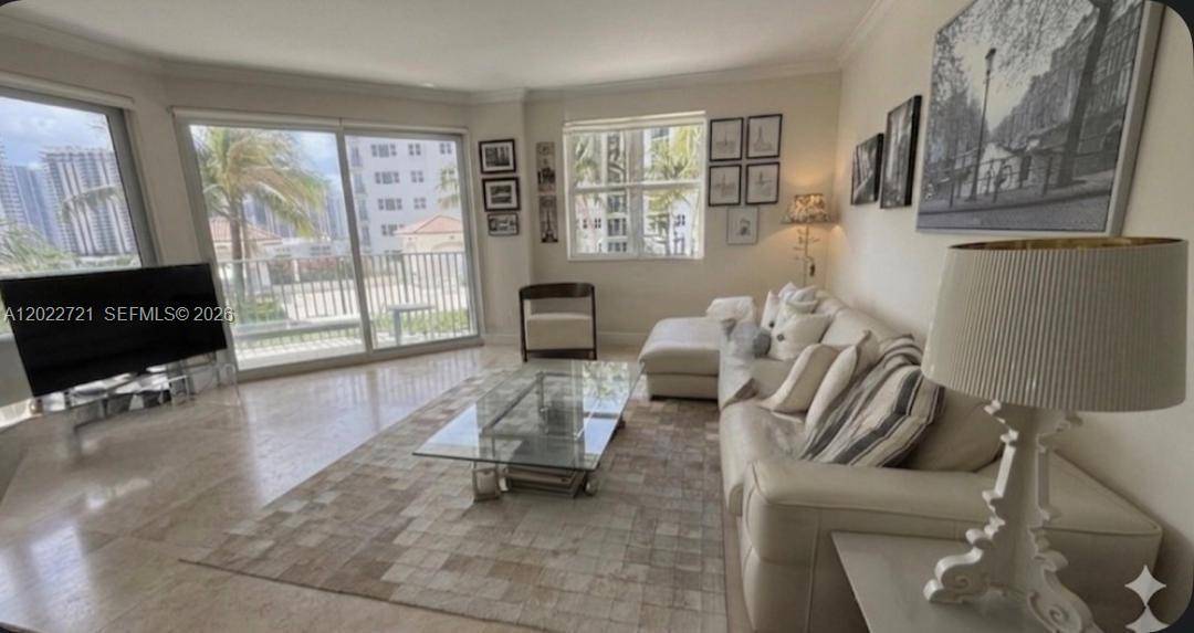 Turnkey 2BR 2BA residence at Turnberry Village offering approximately 1, 312 SF of bright living space with floor to ceiling windows, granite countertops, stainless steel appliances, custom built out closets, ...