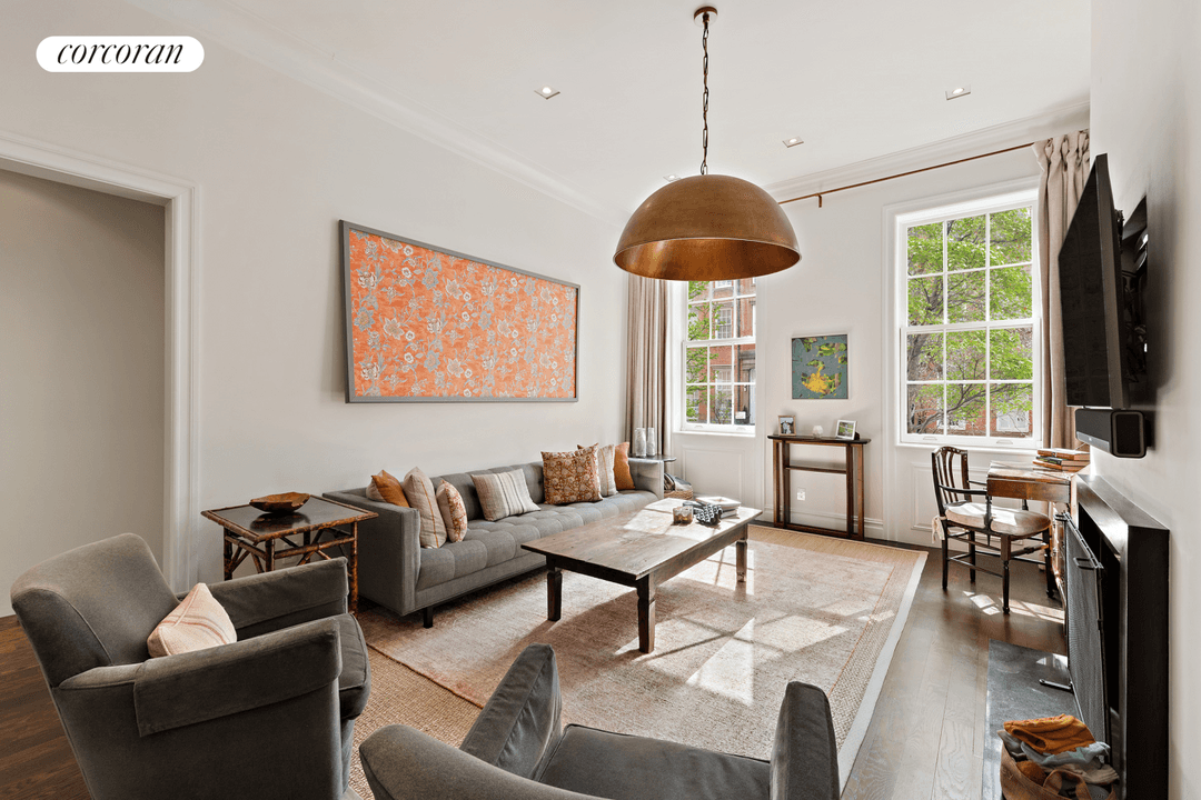 Located mid block on one of the Chelsea Historic District's most distinctive townhouse streets, this meticulous Parlor Floor two bedroom and two bathroom home offers 12 ceilings, a wood burning ...