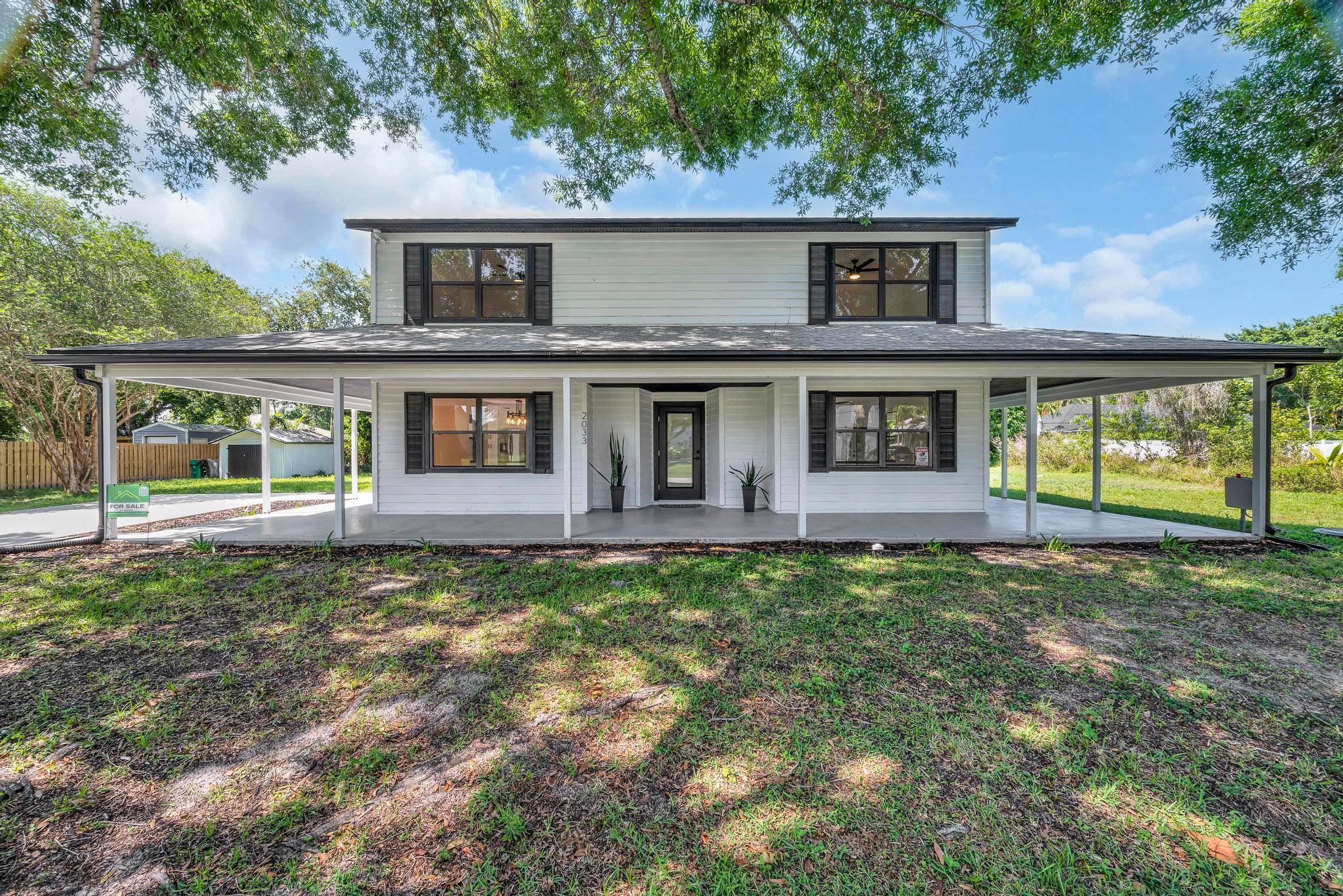 Fully renovated 2 story modern farmhouse on an oversized lot with no HOA just minutes from Tradition !