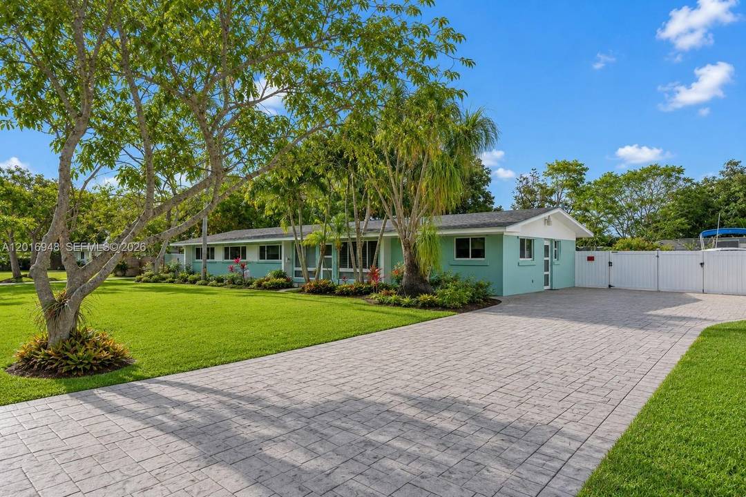Welcome to 9340 SW 178 Street a beautifully updated pool home that blends modern comfort with true South Florida living.
