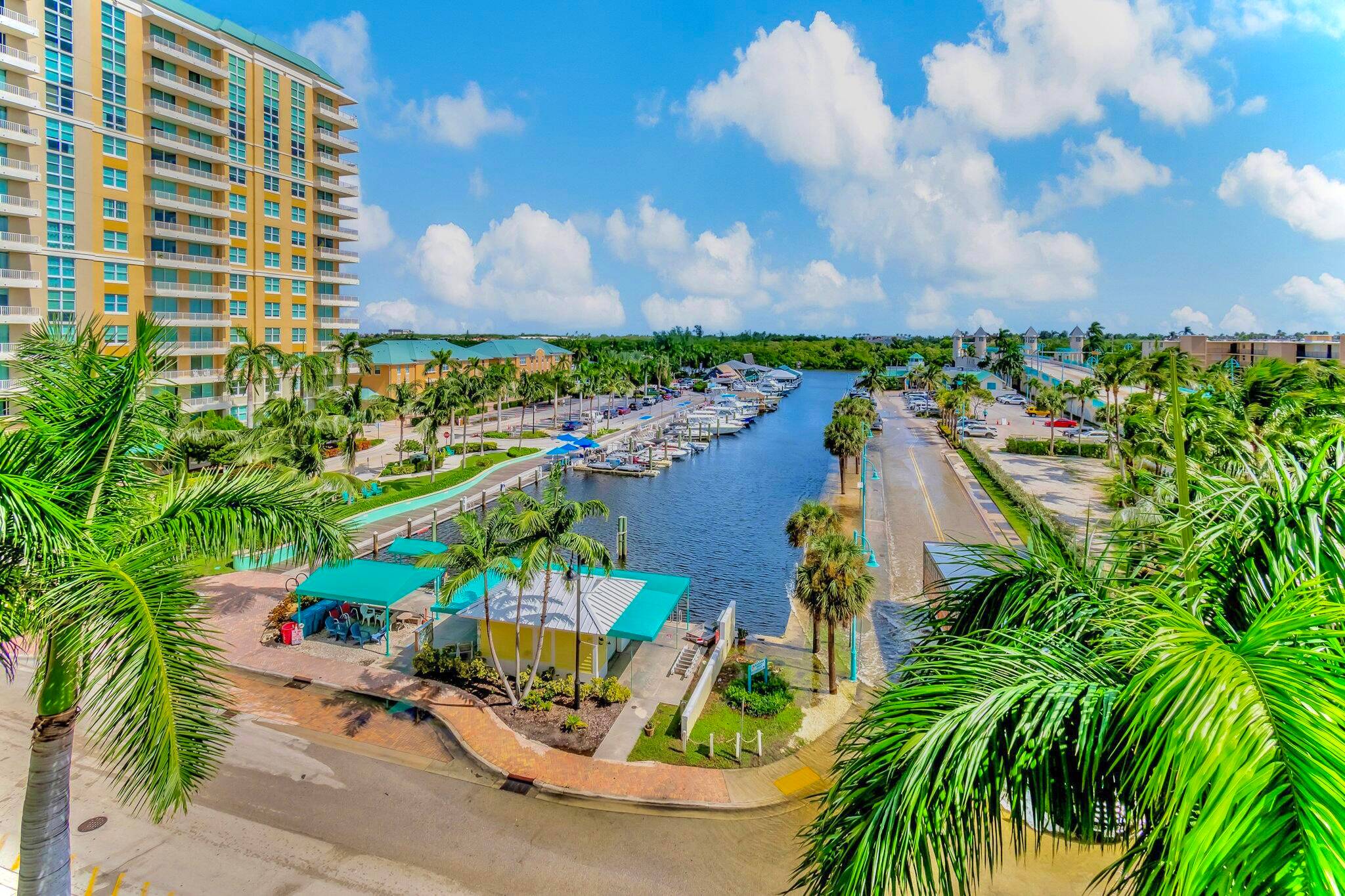 Enjoy coastal living in the highly sought after upscale community of Marina Village at Boynton Harbor Marina.