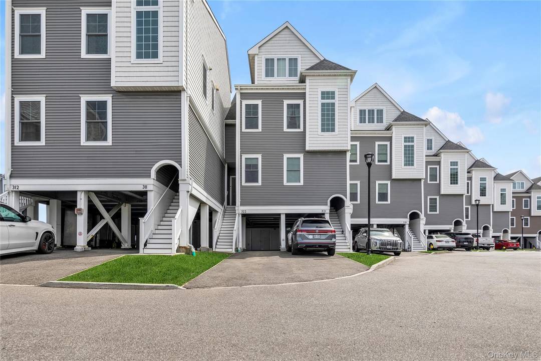 Spectacular Waterfront Townhouse with Scenic Views !