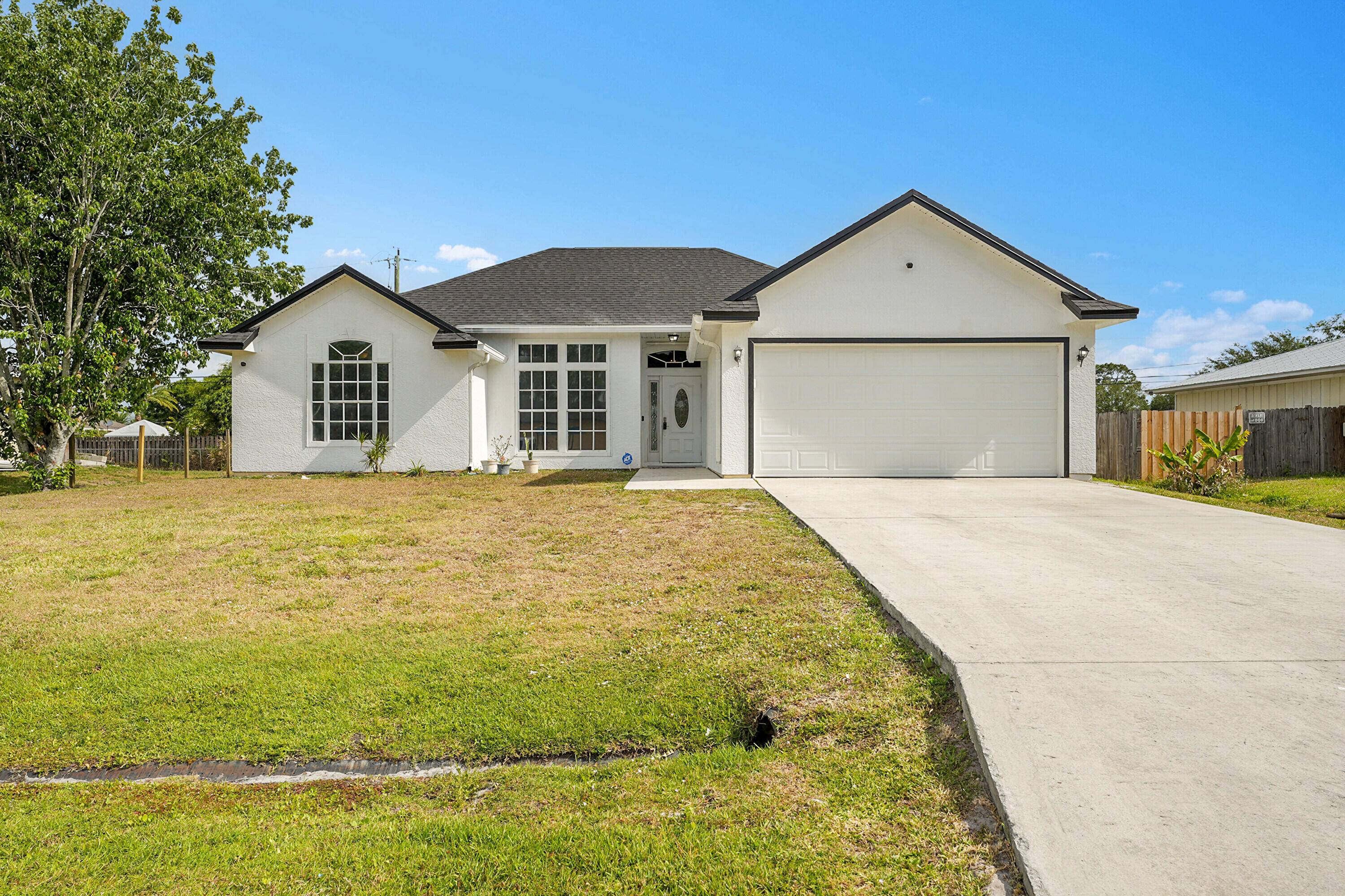 This adorable 3 bedroom, 2 bathroom home is tucked away in a quiet neighborhood.