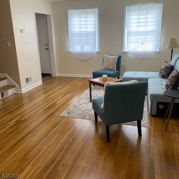 This tastefully and fully renovated 3 bedroom, 1.