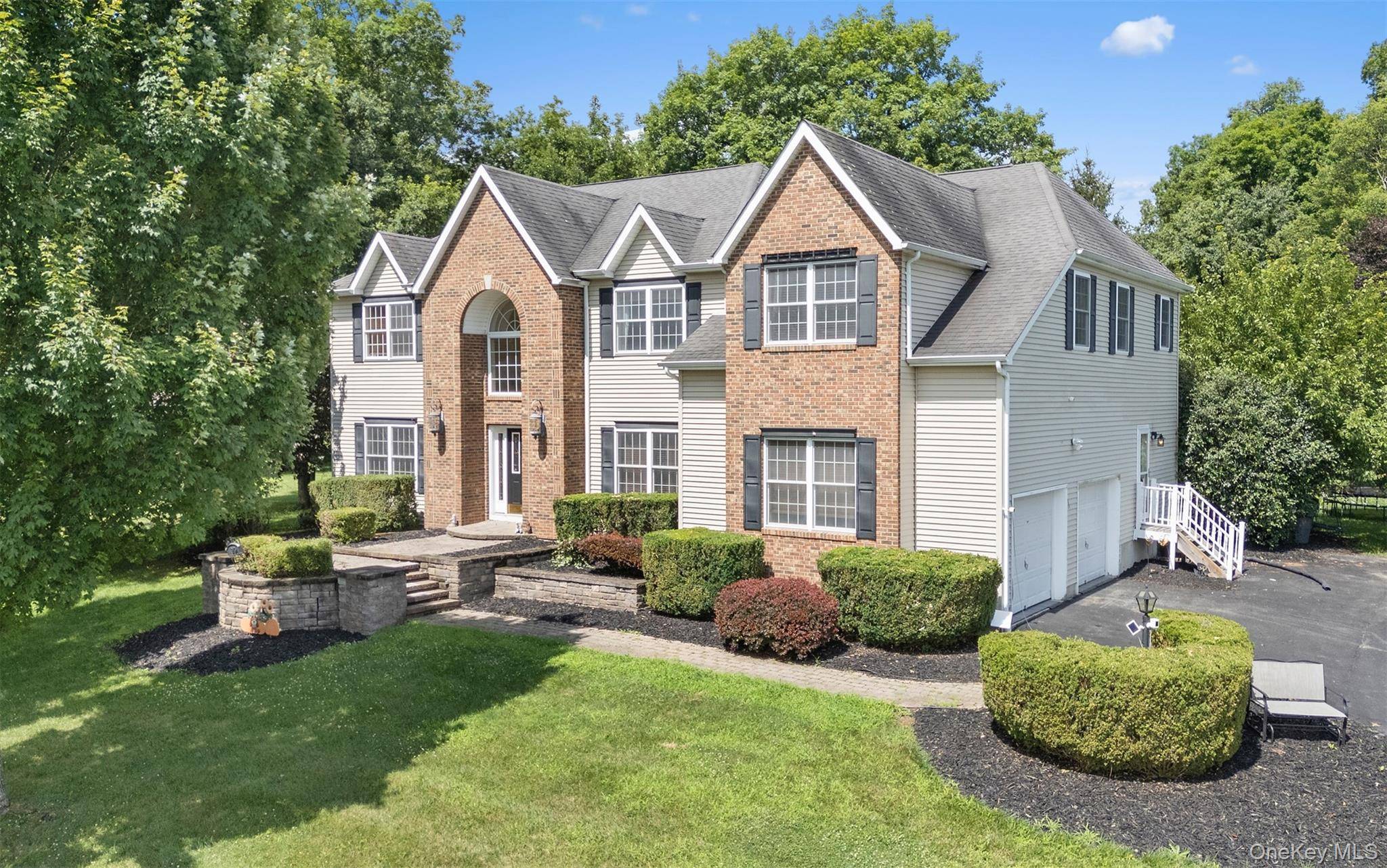 You will adore this stately 3725sf, 10 room, 5 bedroom, 3 full baths colonial, called the Woodbury model, with a dramatic open floor plan, just recently beautifully refreshed and loaded ...