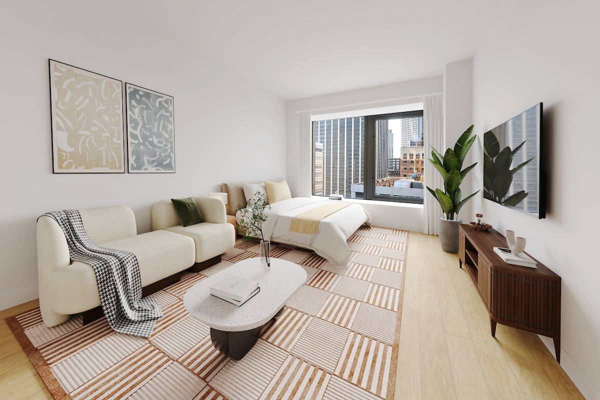 Step into luxury living with residence 29D, a spacious alcove studio boasting high ceilings, bright oversized windows, and a full sized kitchen.