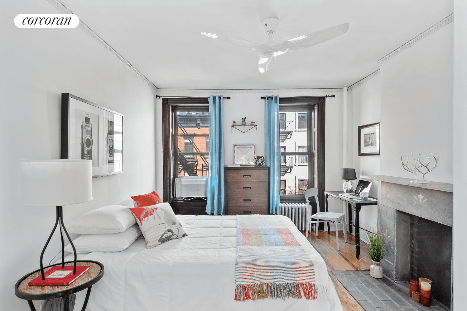 Welcome home to this light and airy railroad style 1BR, located on one of the most desirable tree lined streets in Chelsea.