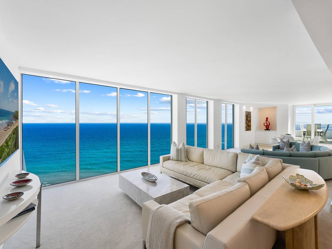 This is truly a special, oceanfront, SE, rooftop Penthouse featuring long views of the Ocean, coastline, beach and sandbars.