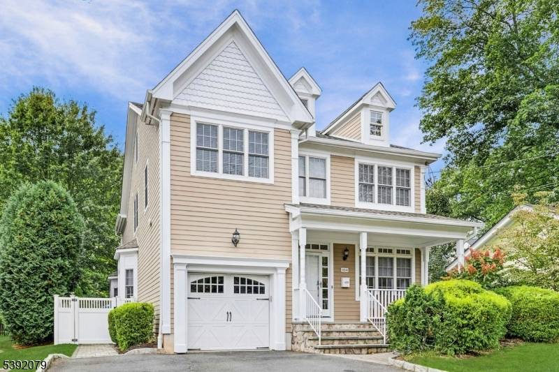 Located on one of Westfield's most desirable streets, this 5 Bedroom, 4.