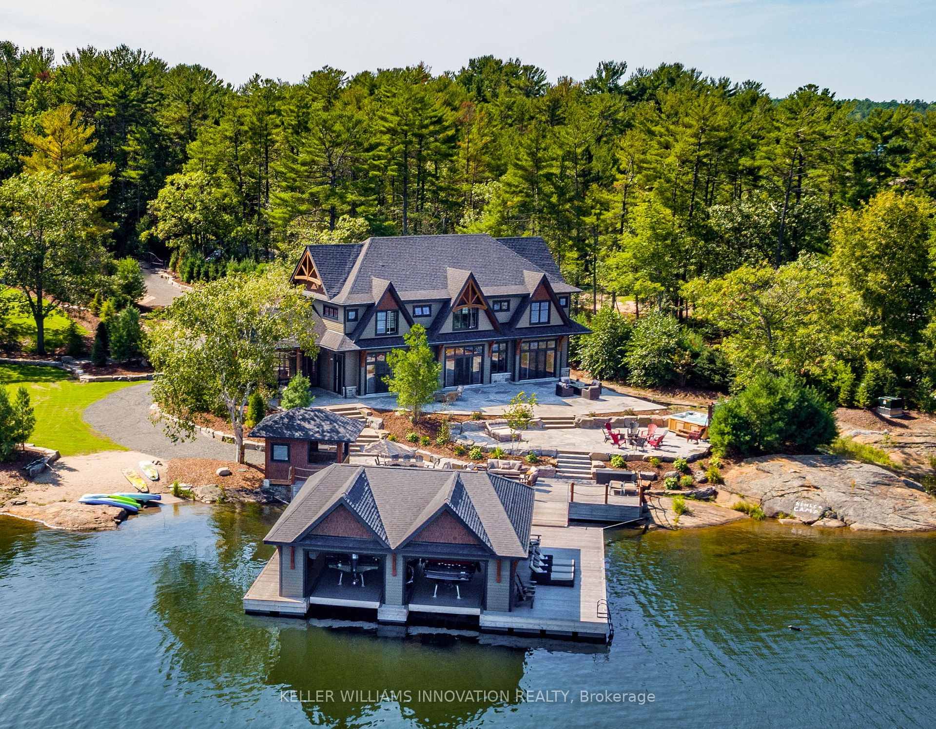 This extraordinary Georgian Bay estate redefines luxury living, offering 744 feet of pristine shoreline and a spectacular 3, 100 sqft year round cottage.