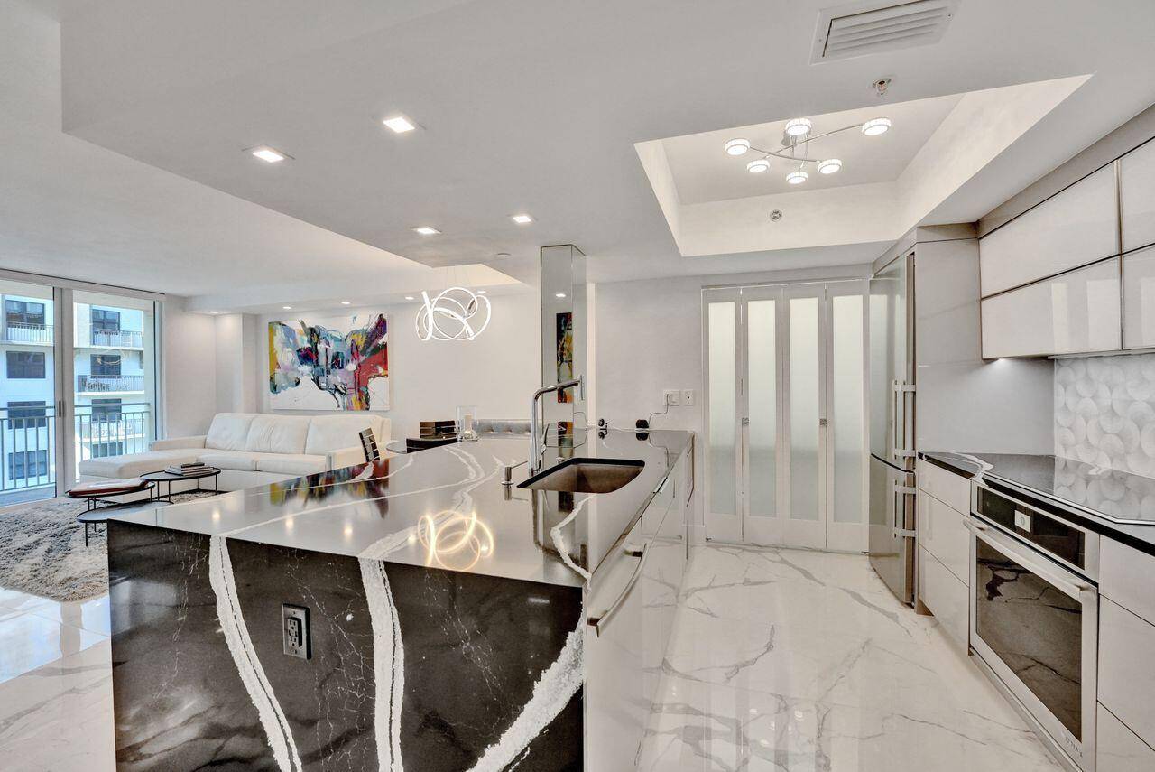 Furnished Rental with amazing views in premier luxury condominium in downtown Boca Raton, centered in Royal Palm Plaza Mizner Park, in close proximity to the beach Boca Resort !