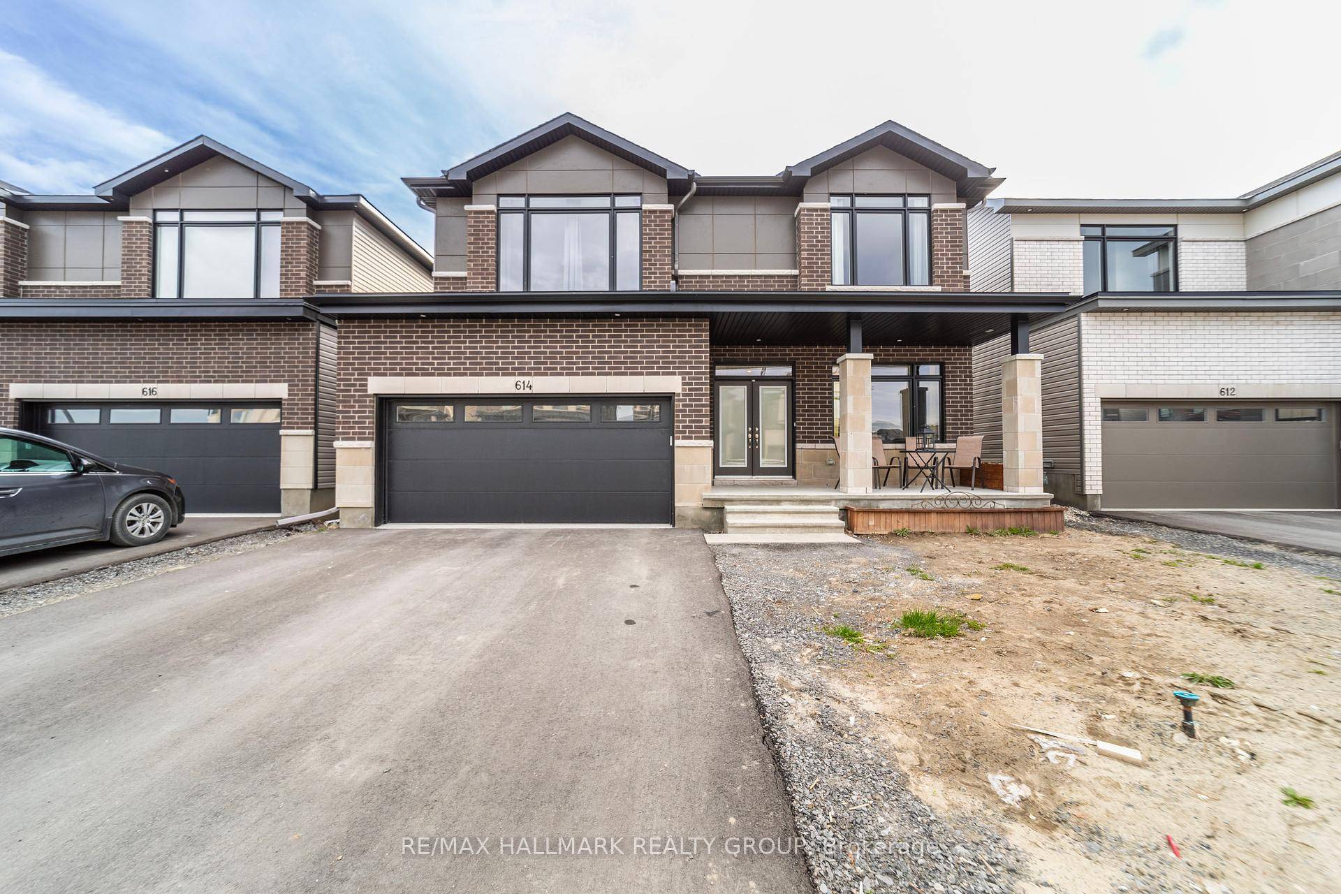 Luxurious, new 7 bdrm home in prestigious Riverside South.