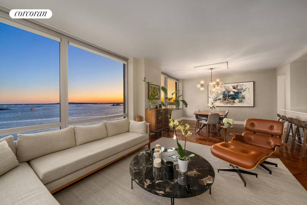 Spectacular sunsets and unobstructed New York Harbor and Statue of Liberty views along with Ellis Island and the Verrazano Bridge await you in this one of a kind 3 bedroom ...