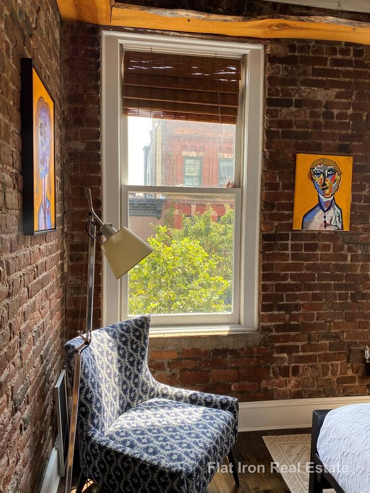 True 1BR in Prewar Elevator Townhouse, Bright and overflowing with charm, this is the NYC dream, right on iconic Perry Street.