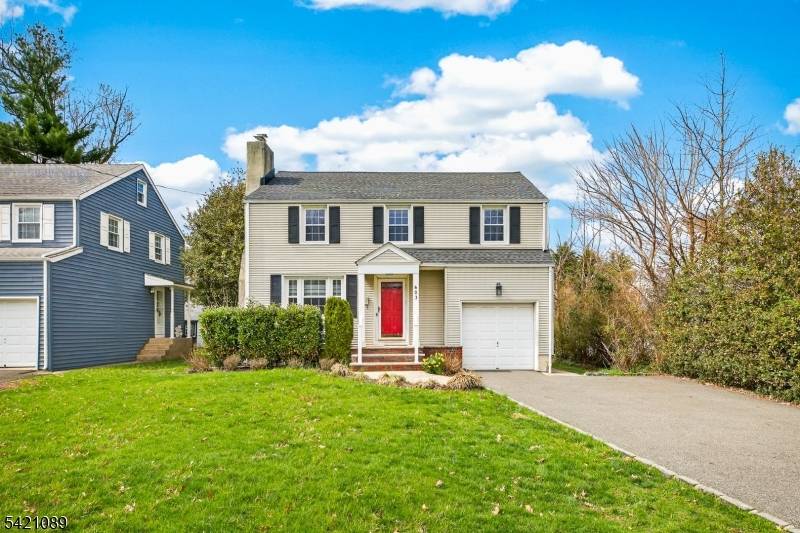 Nestled in one of Cranford's most coveted neighborhoods, 603 Brookside Place is a stunning, move in ready 3 bedroom, 2.