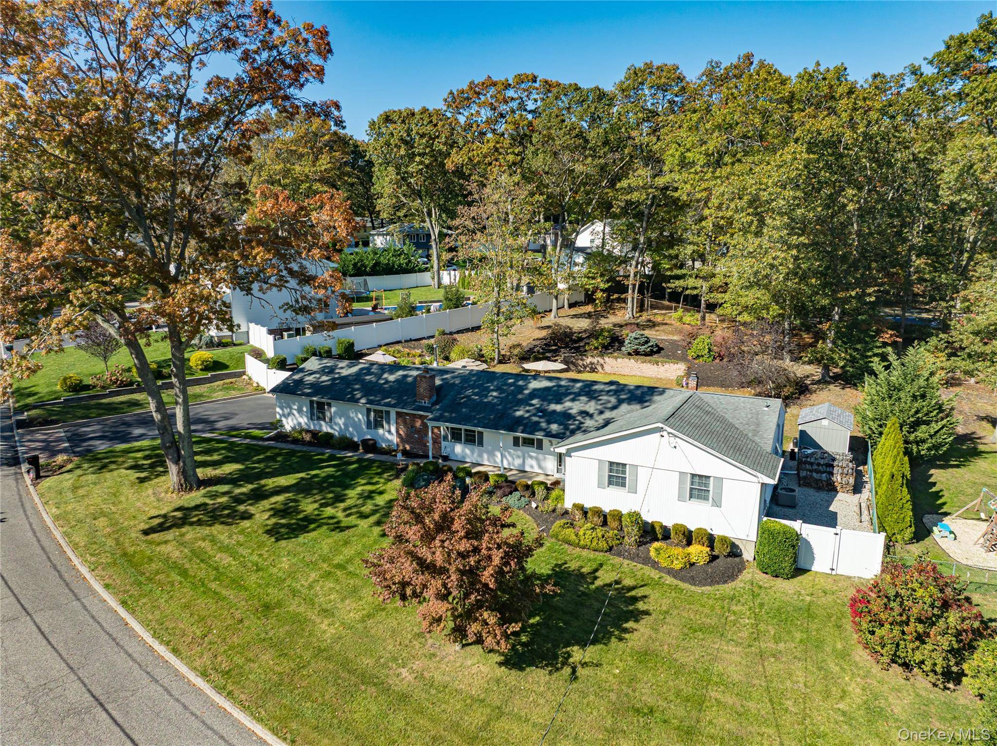 Welcome to 3 Walnut Road, Rocky Point a beautifully maintained 4 bedroom, 2 bath Ranch offering the perfect blend of comfort, charm, and functionality.