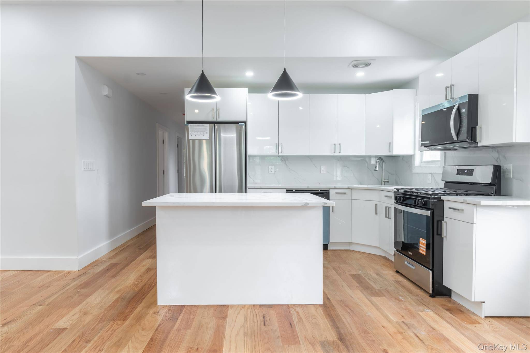 Detached Legal 2 Family House 40 x 100 Lot size High End Renovations Central A C Split Units That Heat and Cool Modern Kitchen s With Spacious Island s 8 ...