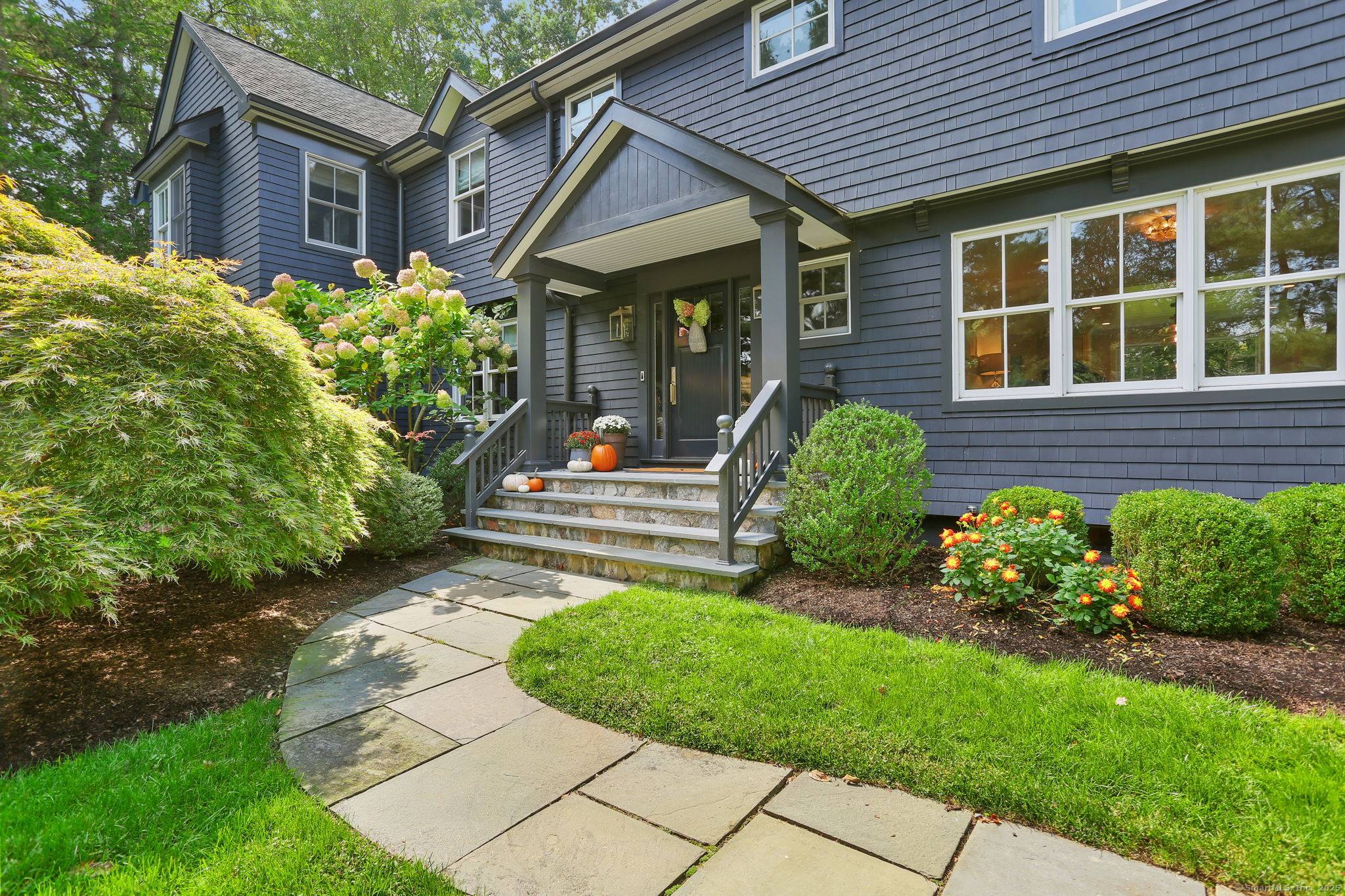 Located in the highly sought after Behind the Y neighborhood, this expanded and beautifully renovated 5 bedroom Colonial is truly move in ready.