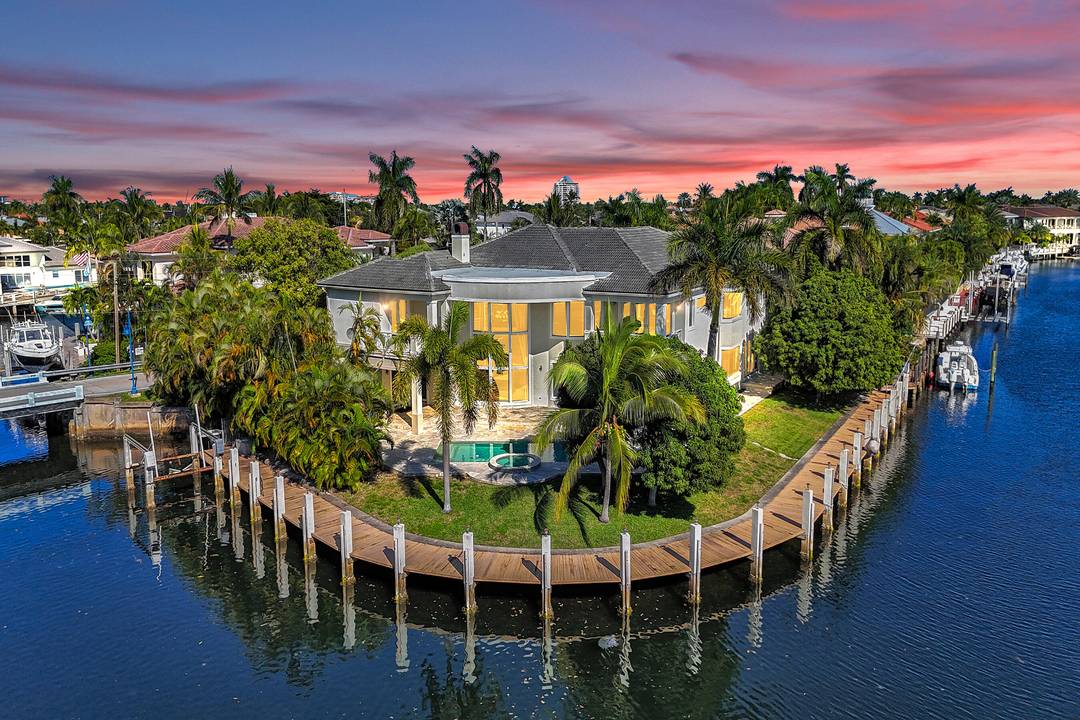 Welcome to your rarely available Gated WATERFRONT Point Lot Estate with 223' of deep water frontage !