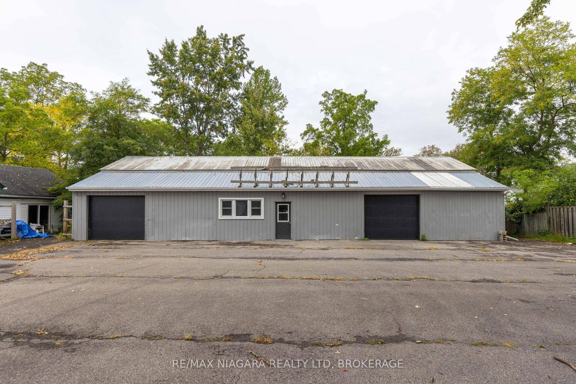 Work, earn, and live with this rare opportunity in the heart of Ridgeway featuring a 2, 100 sq.