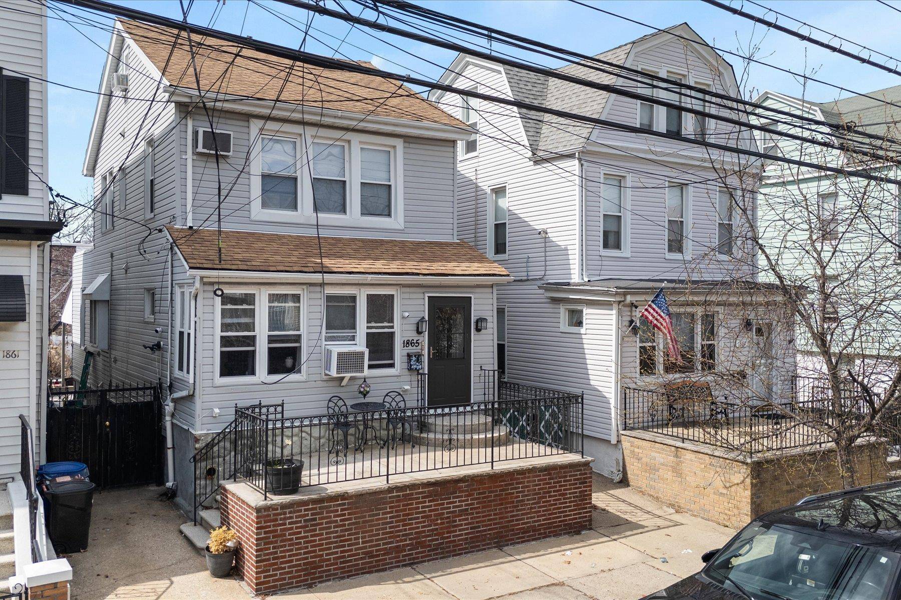 This fully renovated two family home offers modern updates and a versatile layout.