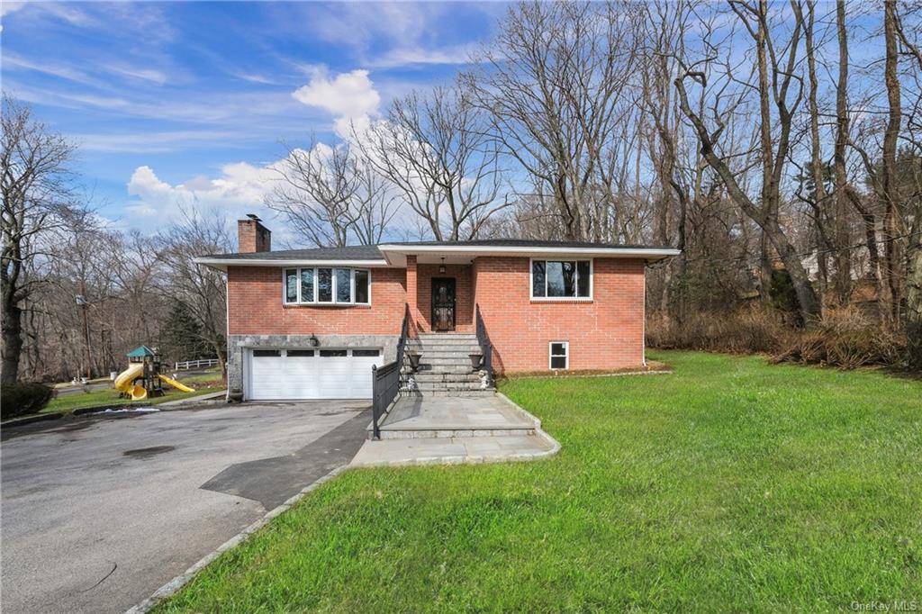 Bright and open Edgemont School District home on a gorgeous level half acre property.