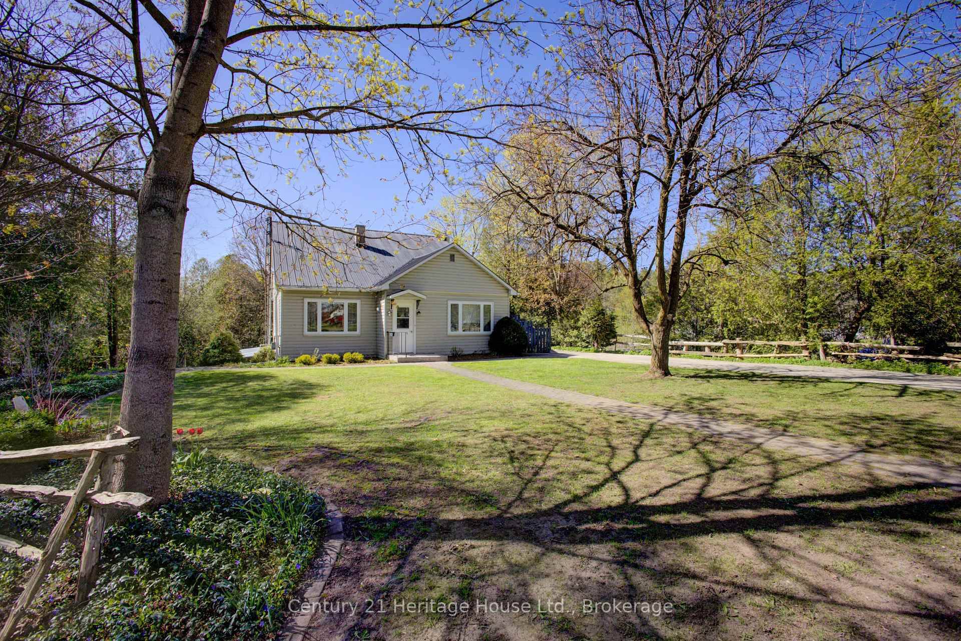 Backing onto the Saugeen river and nestled next to the scenic Heritage Bridge walkway is this versatile home offering the perfect blend of convenience and functionality.